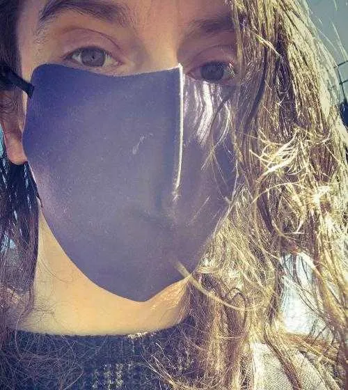 Daniel Johnson wearing a purple face mask on his first day to work