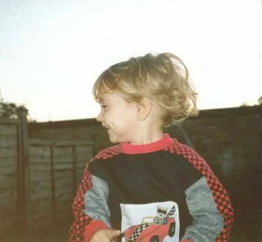 4 year old Daniel Johnson playing in the garden